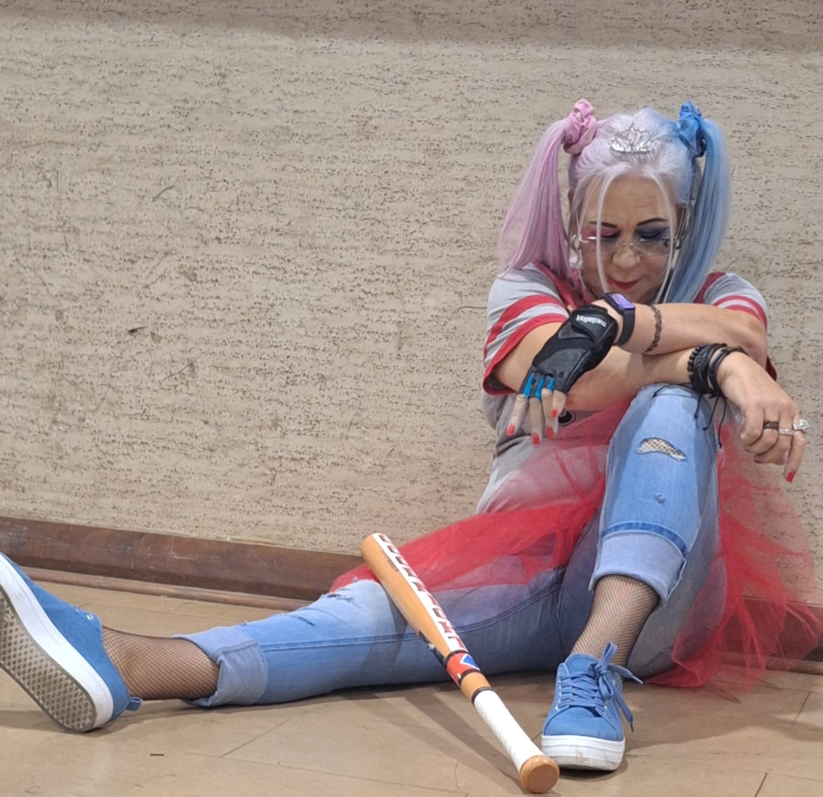 Karen in a playful costume with pink and blue pigtails